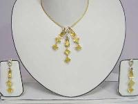 Diamond Studded Gold Pendant Sets