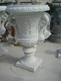 carved stone flower pots