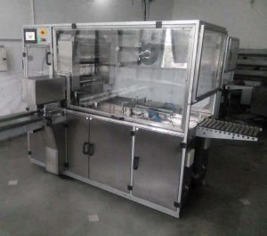 HIGH SPEED OVER WRAPPING MACHINE