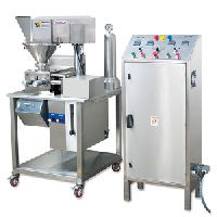 LABORATORY SCALE ROLL COMPACTOR machine