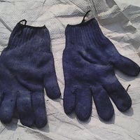 Old knitted hand gloves
