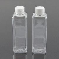 square massage oil white glass bottles