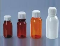 plastic cough syrup bottles