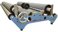 cloth rolling machine